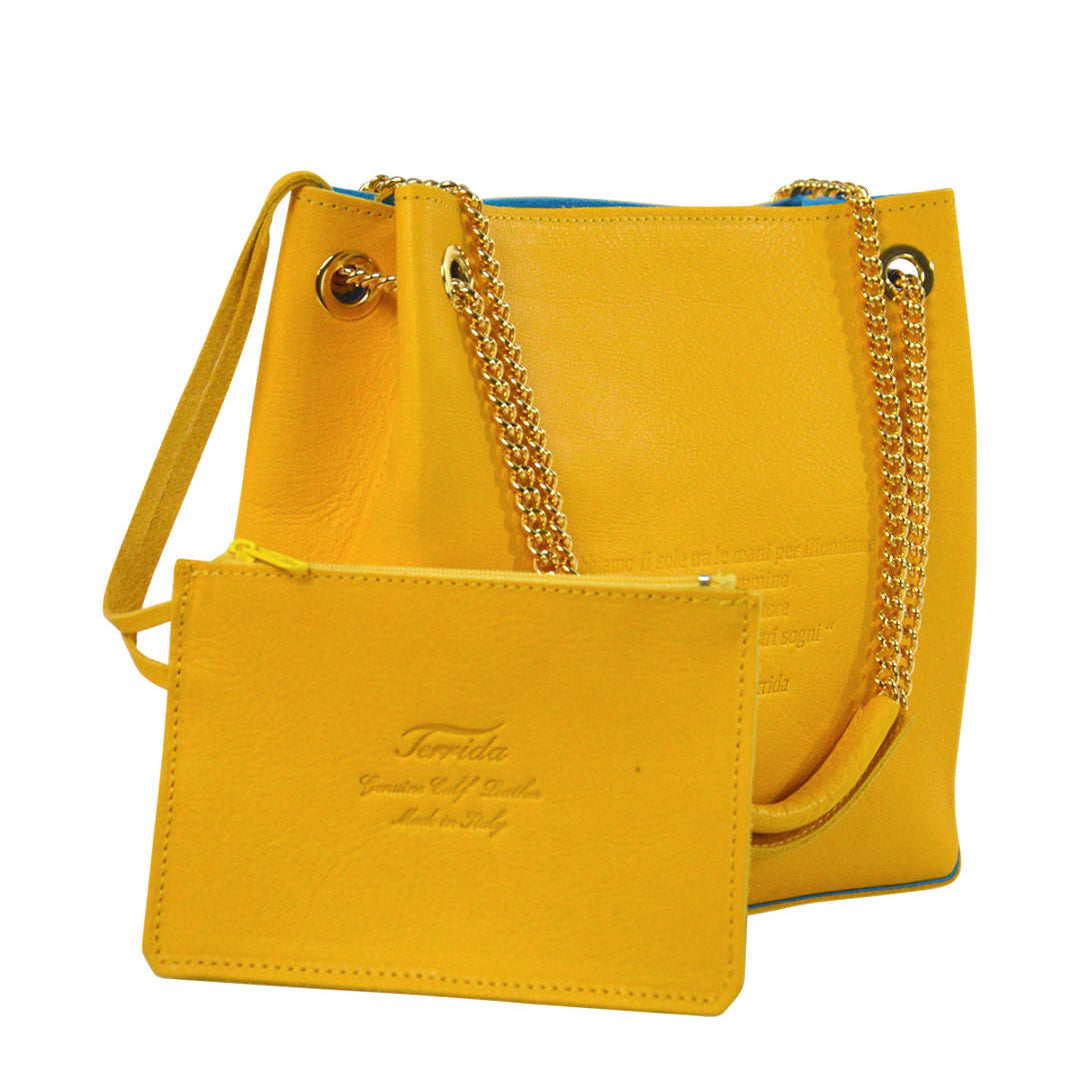 Yellow handbag with gold chain and matching pouch on a white background